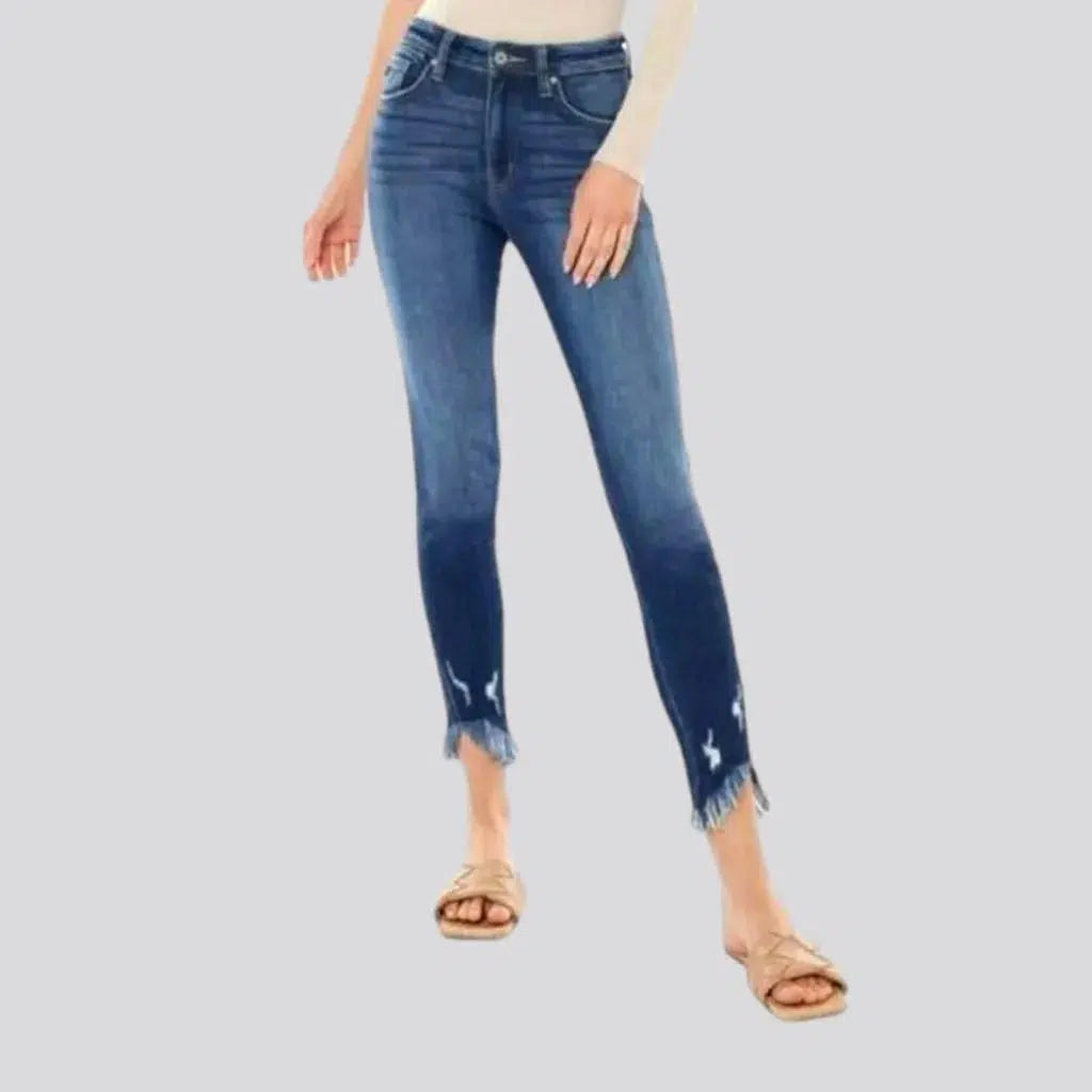 Medium-wash skinny jeans
 for ladies